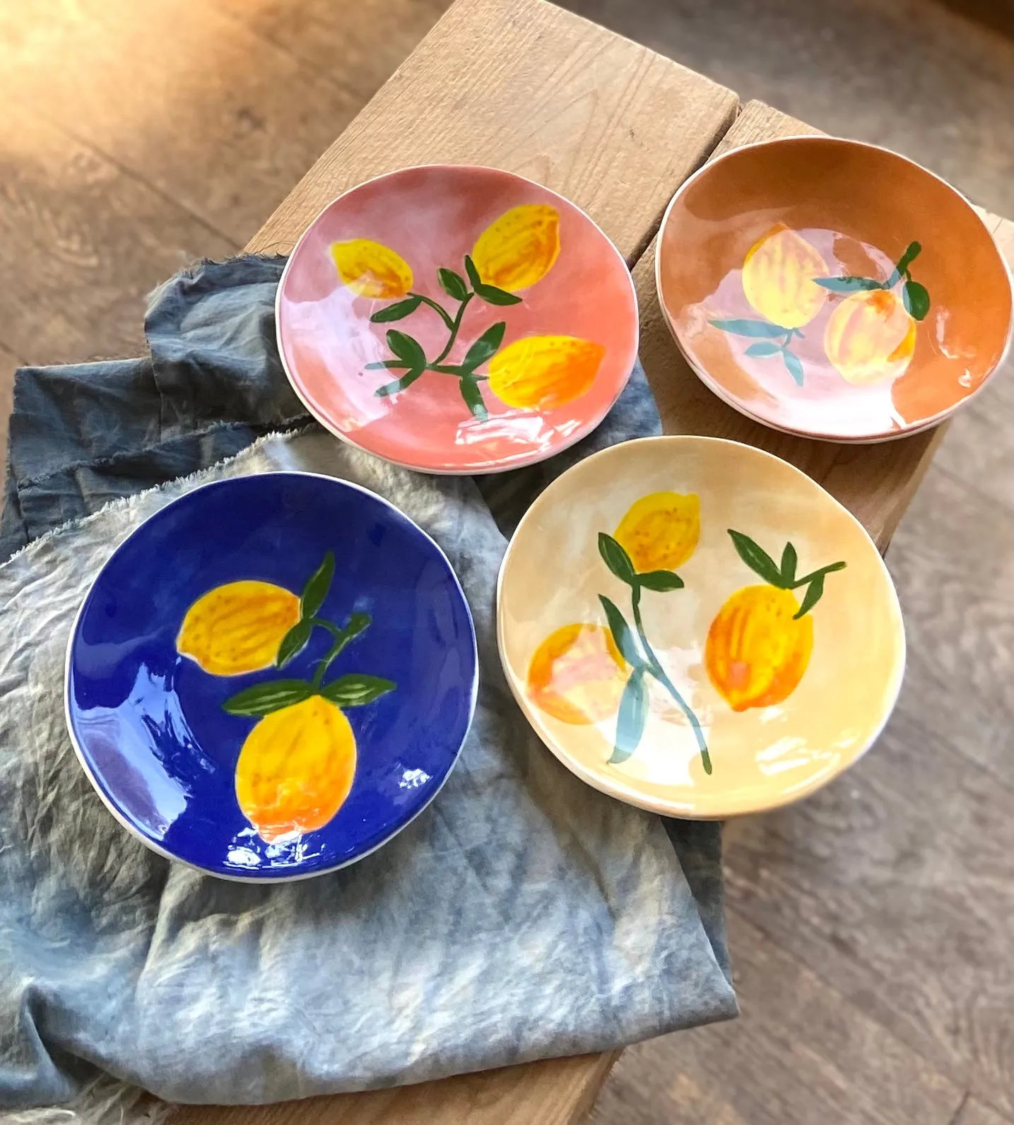 Set Of Four Colourful Lemon Fruit Plates