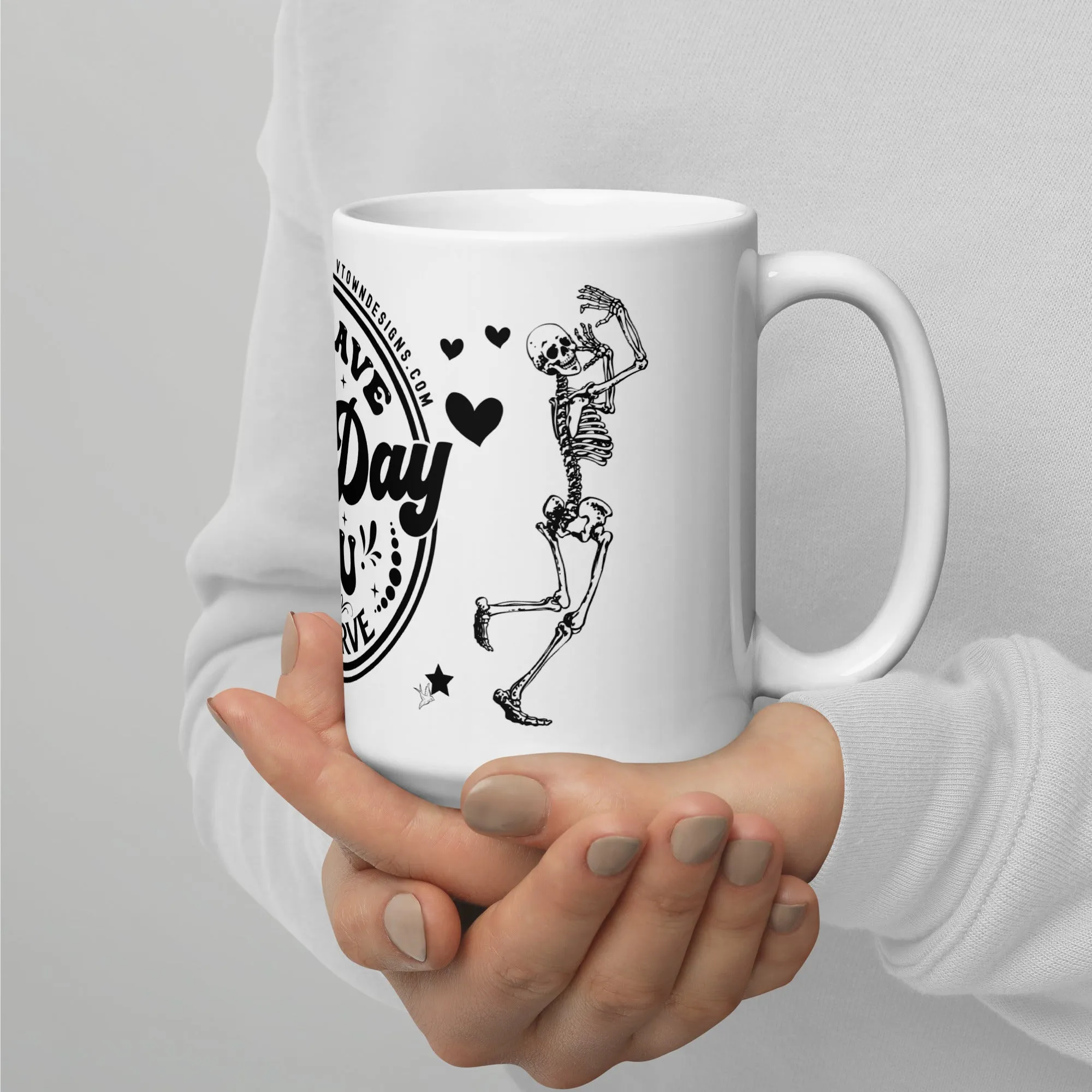 Sturdy & Glossy 15 oz Ceramic Mug featuring 'Have The Day You Deserve Skeleton Humor'