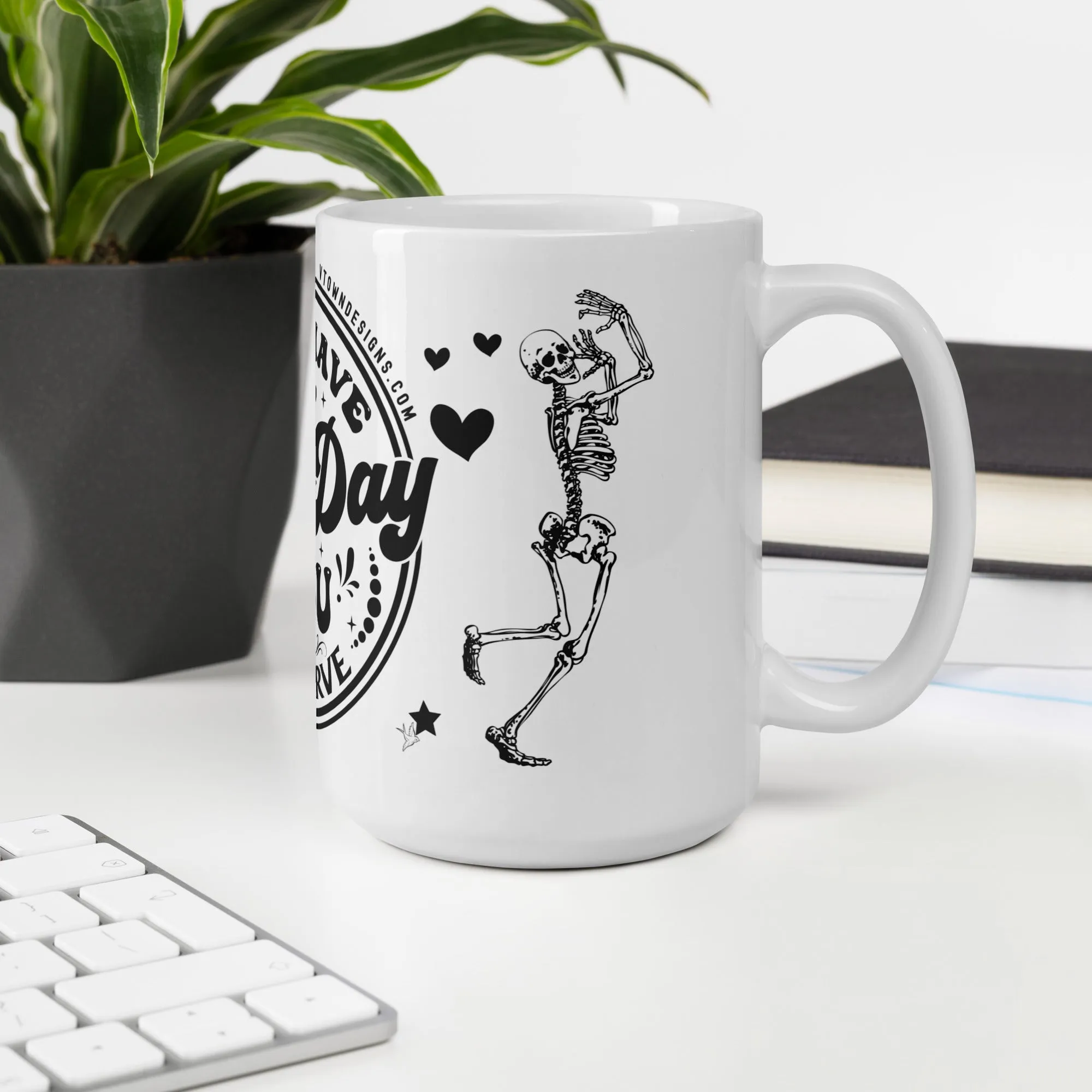 Sturdy & Glossy 15 oz Ceramic Mug featuring 'Have The Day You Deserve Skeleton Humor'